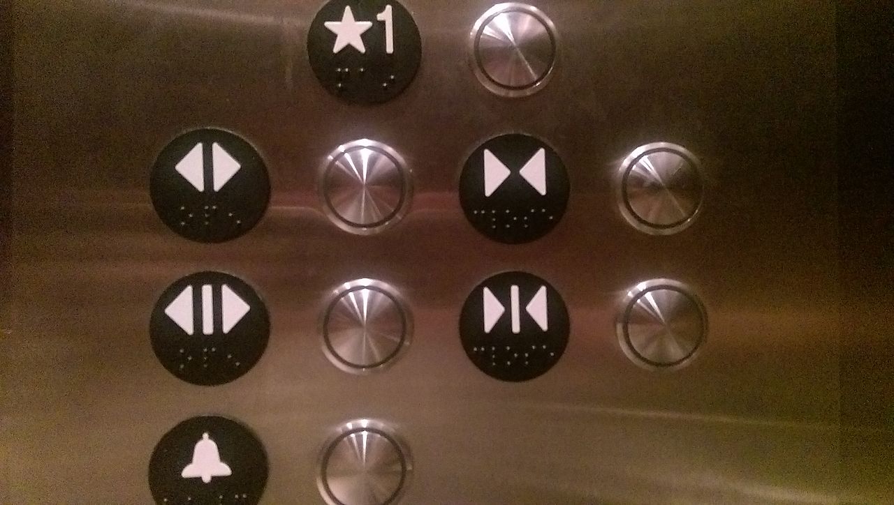 Dual elevator door buttons